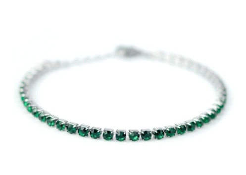 BRACCIALE TENNIS ARGENTATO CON CRISTALLI COLOR SMERALDO - maxifarmacia.it